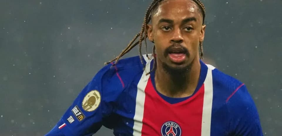 Player running during a match in PSG jersey