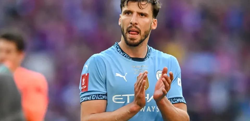 Player applauding in Manchester City kit after match