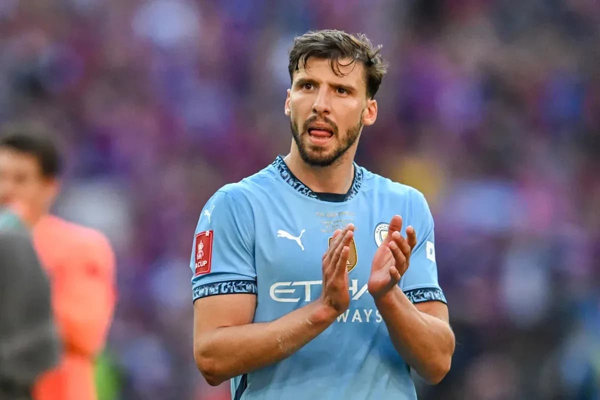 Player applauding in Manchester City kit after match