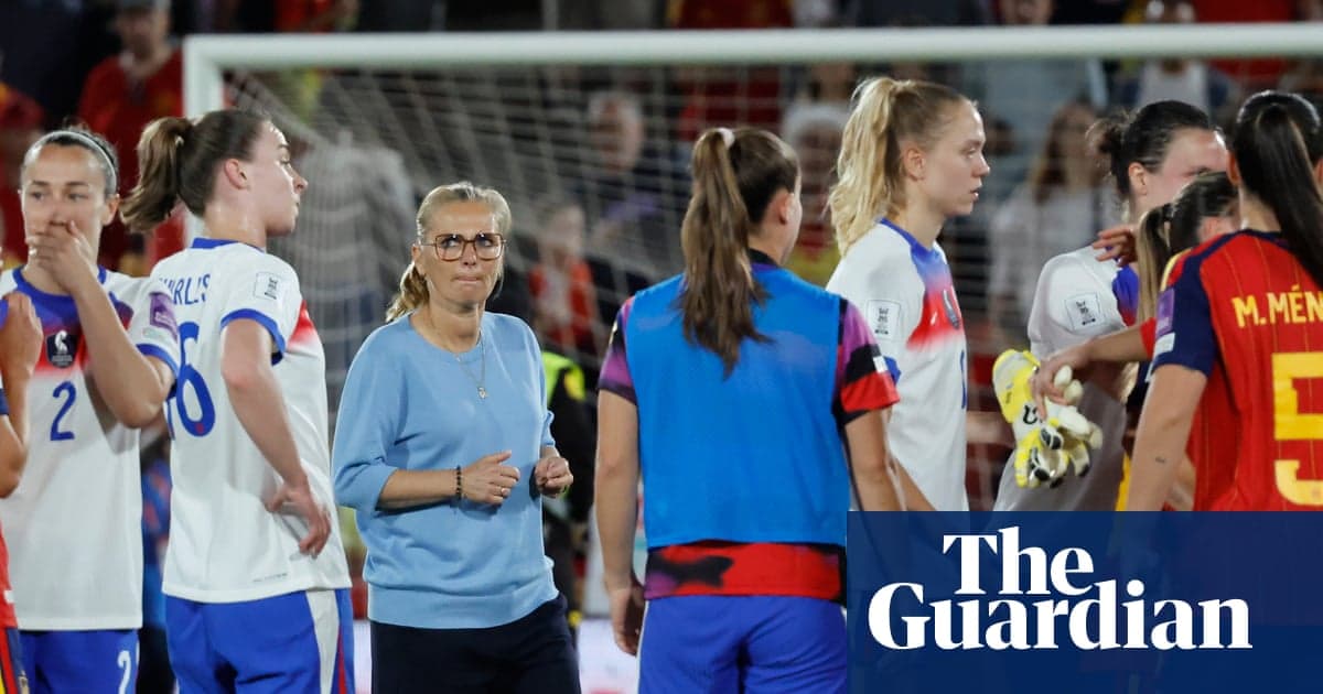 Players and coach interacting after match conclusion