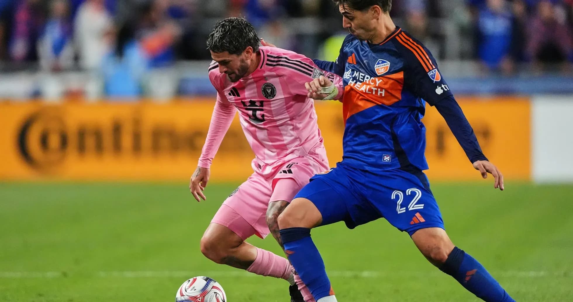 FC Cincinnati II player tackling Inter Miami II player