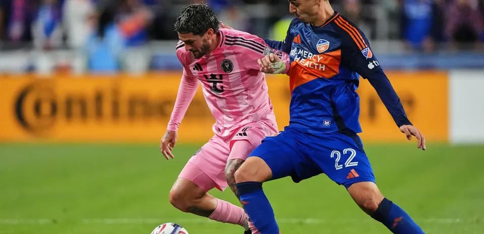 FC Cincinnati II player tackling Inter Miami II player
