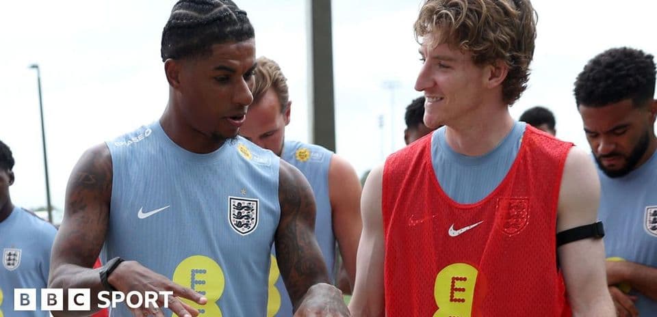 Players talking during England training session