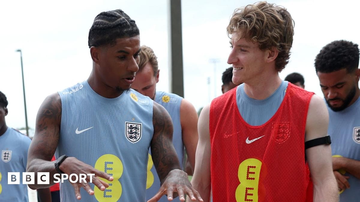 Players talking during England training session
