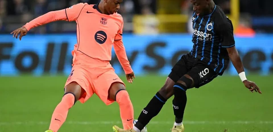 Two players contesting the ball during a match