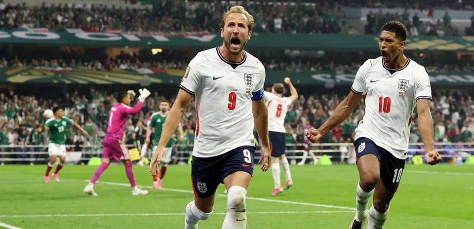 England players celebrating goal during match against Mexico