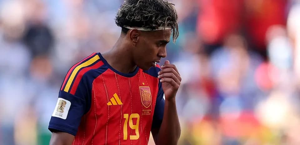 Spain player in red jersey during match