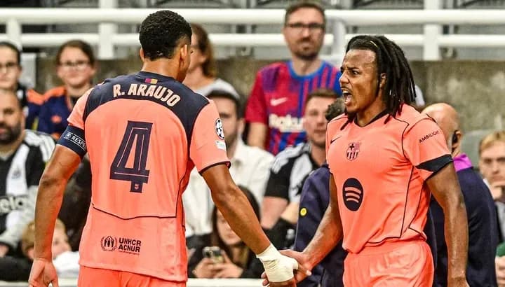 Two players celebrating during a match in jerseys