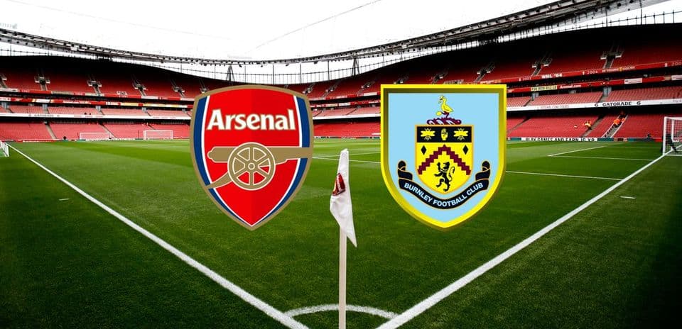 Arsenal and Burnley logos on stadium pitch