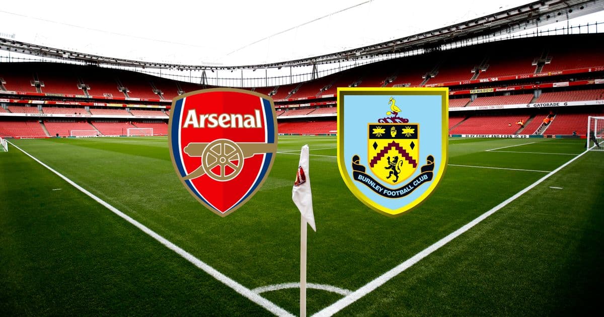 Arsenal and Burnley logos on stadium pitch