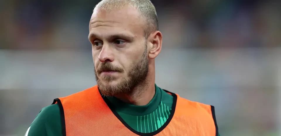 Goalkeeper in training vest during warm-up