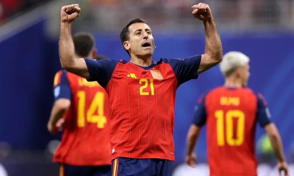 Player celebrating after scoring for Spain team
