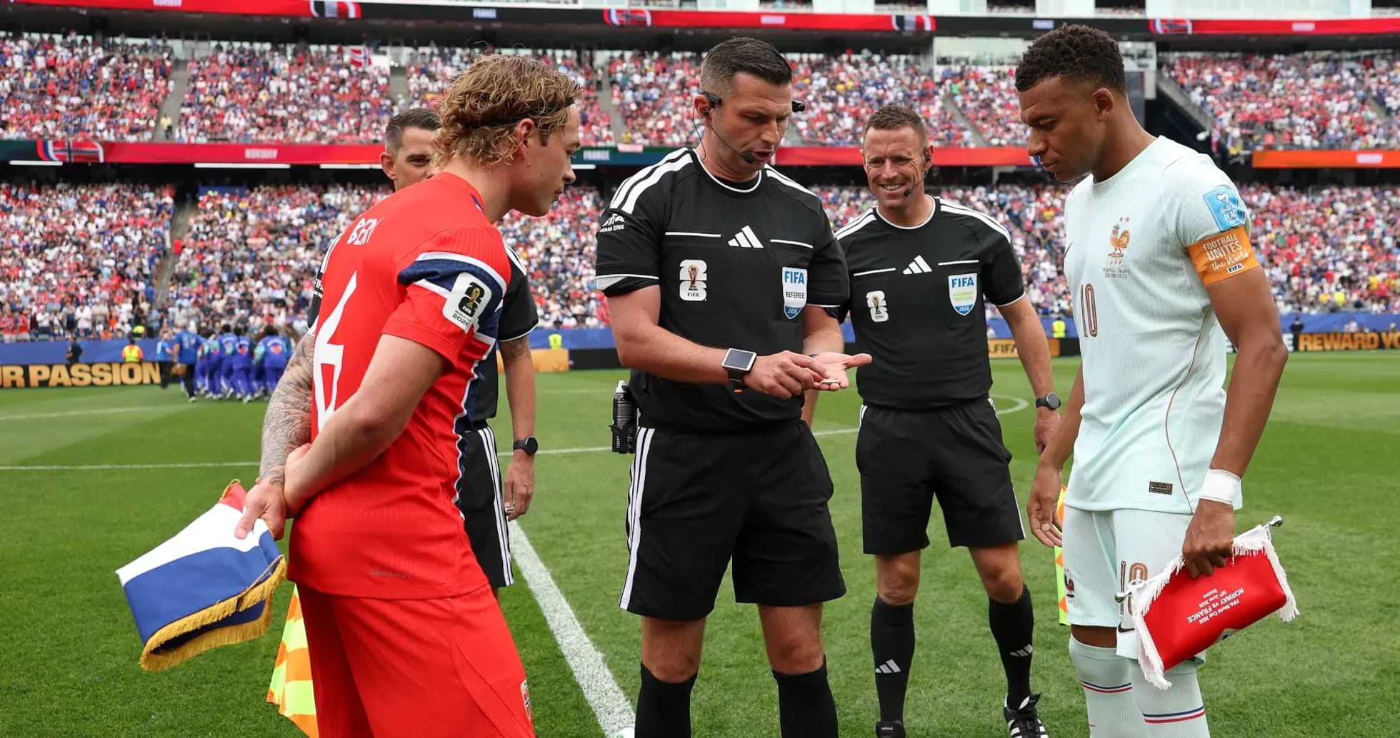 Players and referees at coin toss before match