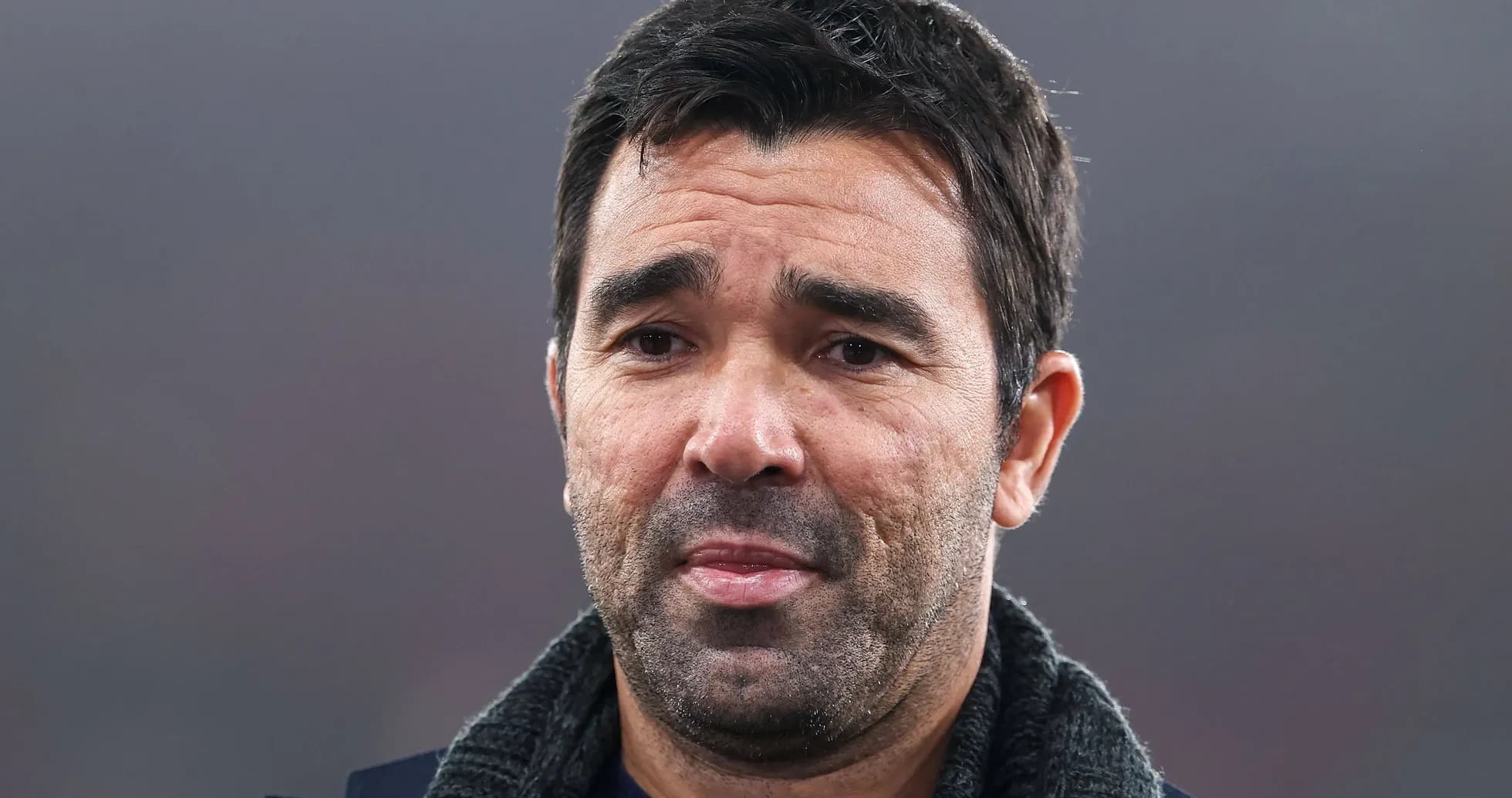 Close-up of a coach during a match