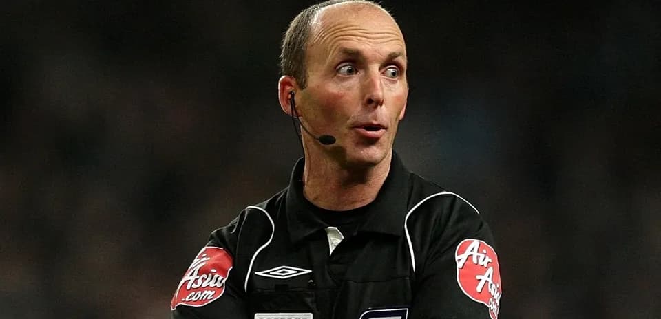 Referee officiating during a football match