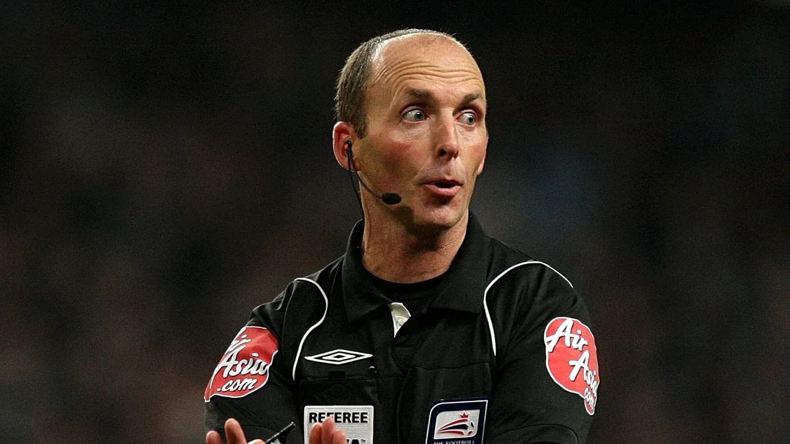 Referee officiating during a football match