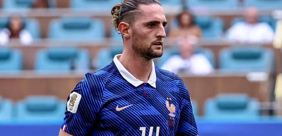 Player in France national team jersey on field