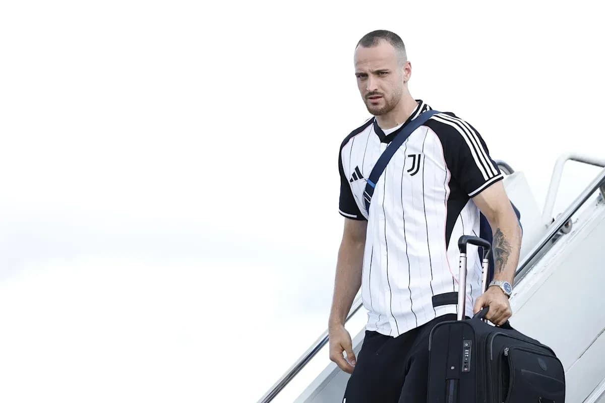 Player arriving with luggage at airport terminal