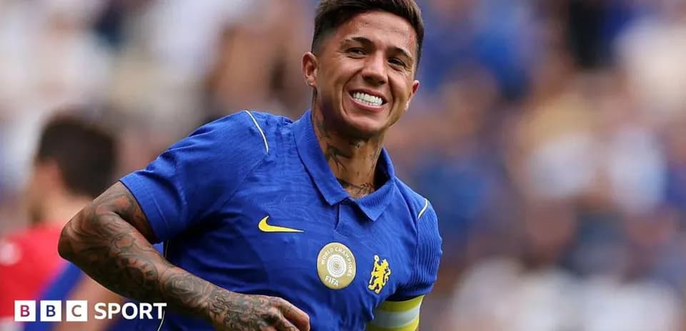 Player in blue jersey celebrating on the field