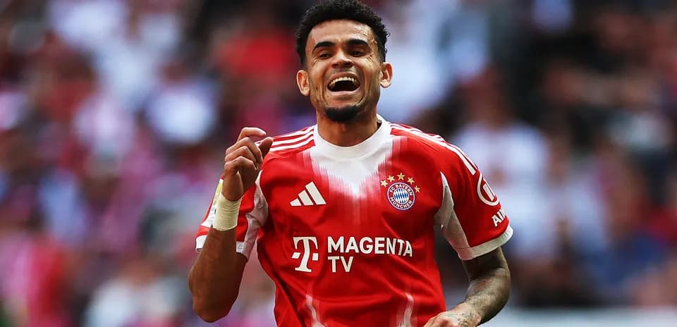 Player celebrating a goal in Bayern Munich kit