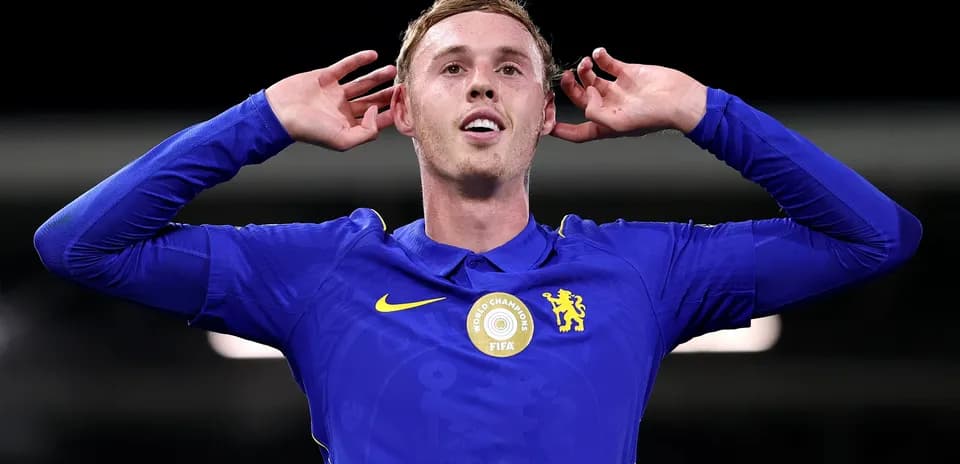 Player celebrating in Chelsea blue kit during match