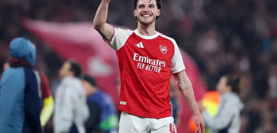 Player celebrating victory on the pitch