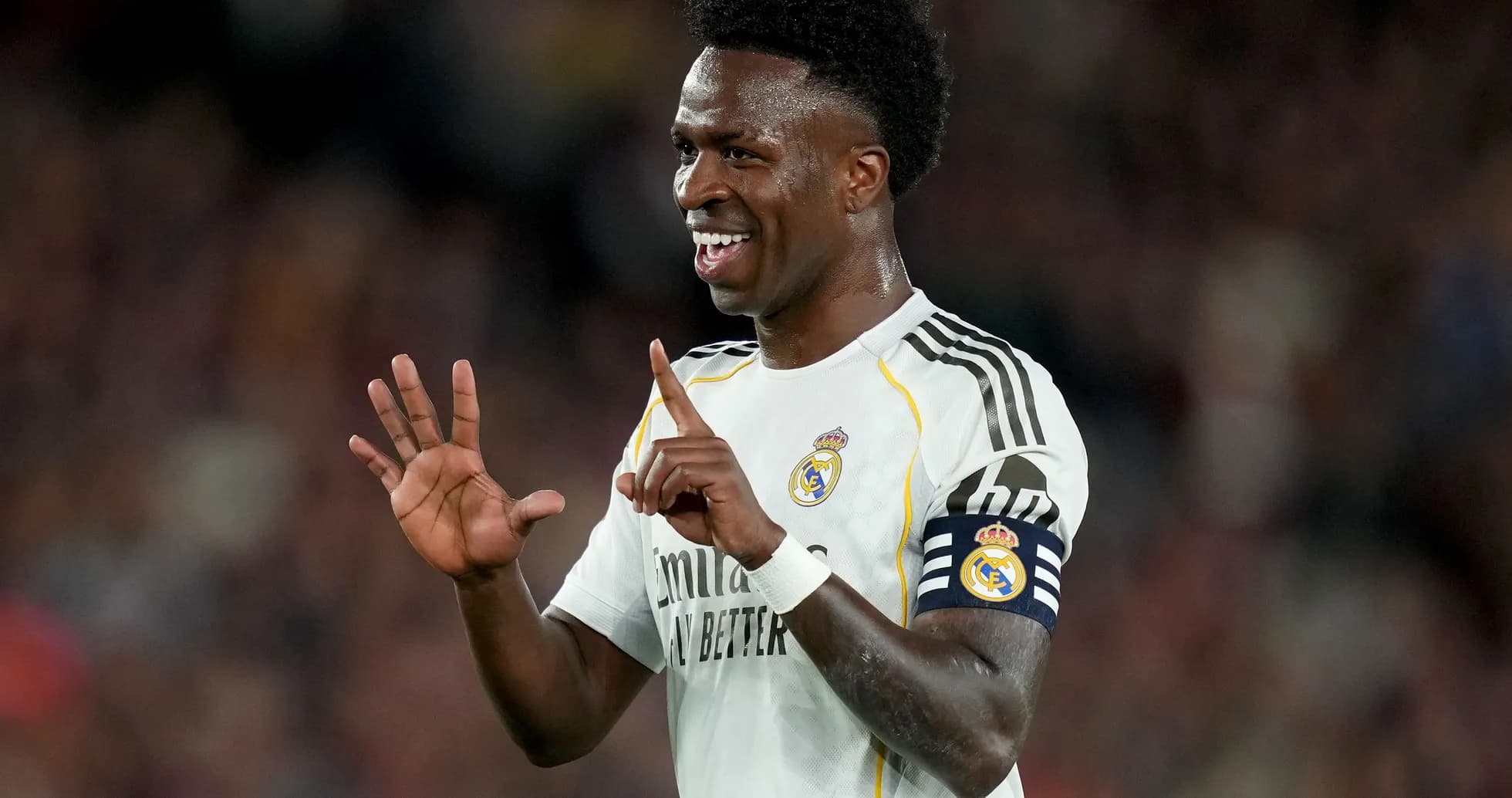 Player celebrating during match with raised hands