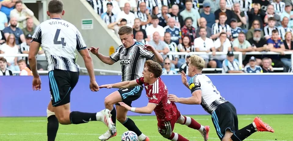 Players contesting for the ball during a match