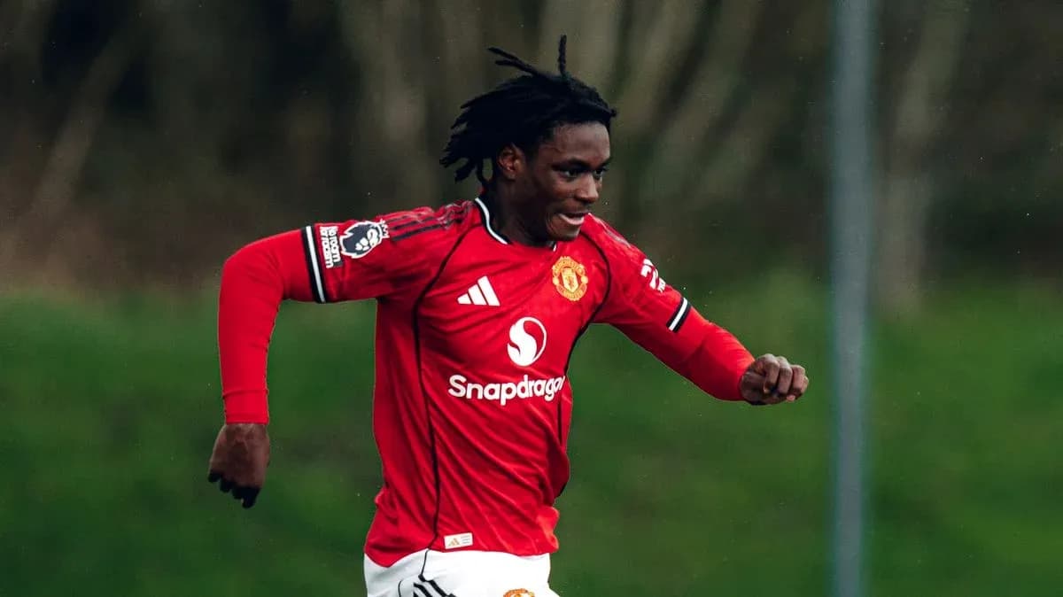 Player in red Manchester United kit running on field