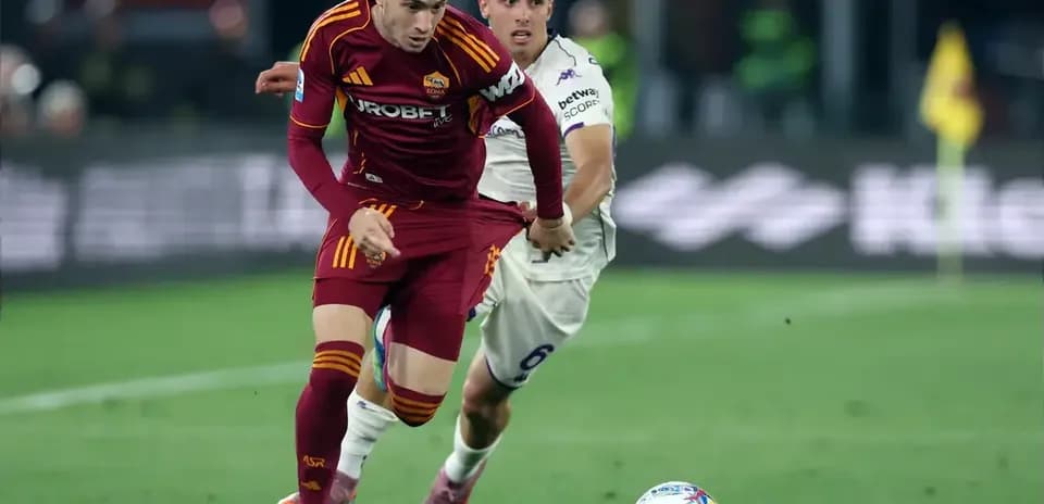 Two players competing for the ball during match