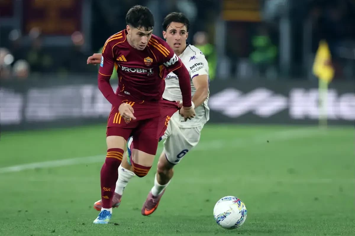 Two players competing for the ball during match