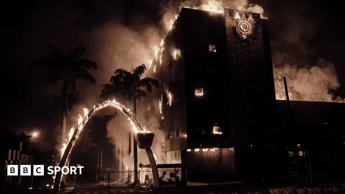 Building engulfed in flames at night