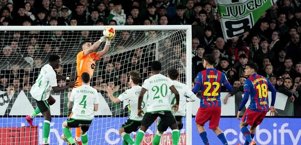 Goalkeeper catching the ball during a match