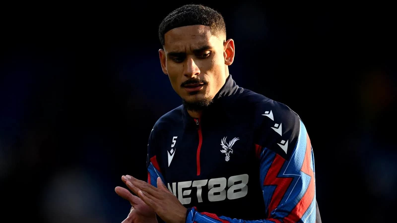 Player warming up in Crystal Palace training kit