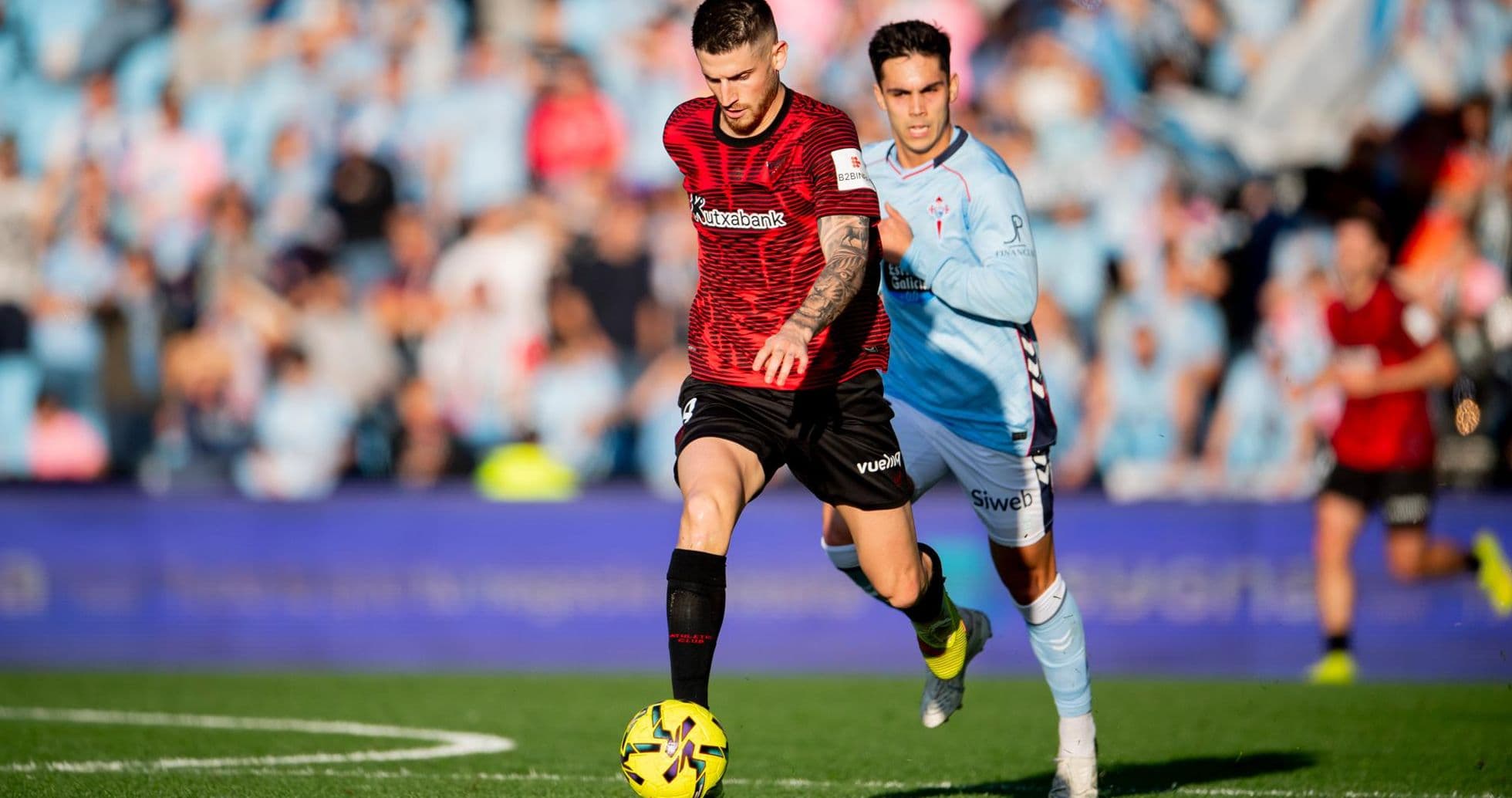 Player dribbling during Athletic Club vs Celta Vigo match