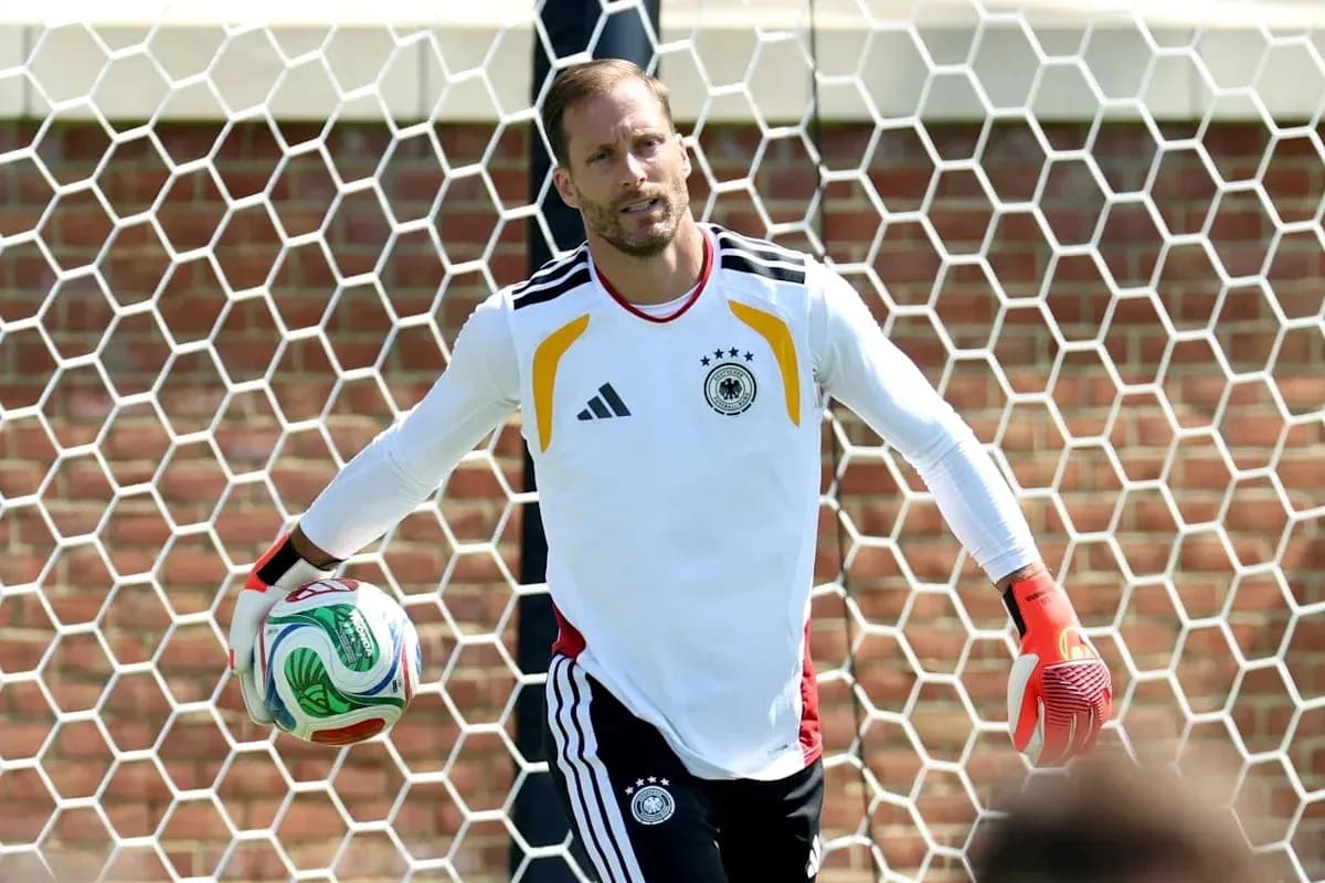 Goalkeeper holding a soccer ball in training session