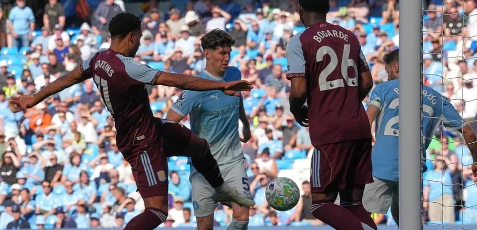 Players contesting during Manchester City vs Aston Villa
