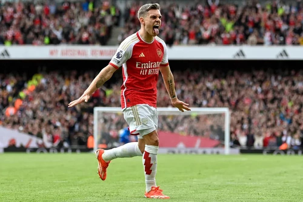 Arsenal player celebrating a goal at stadium