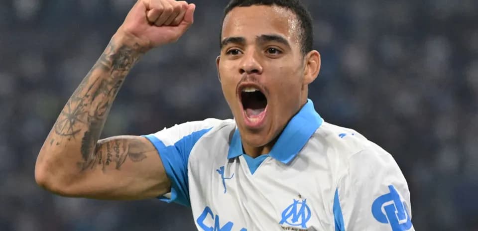 Player celebrating a goal for Marseille