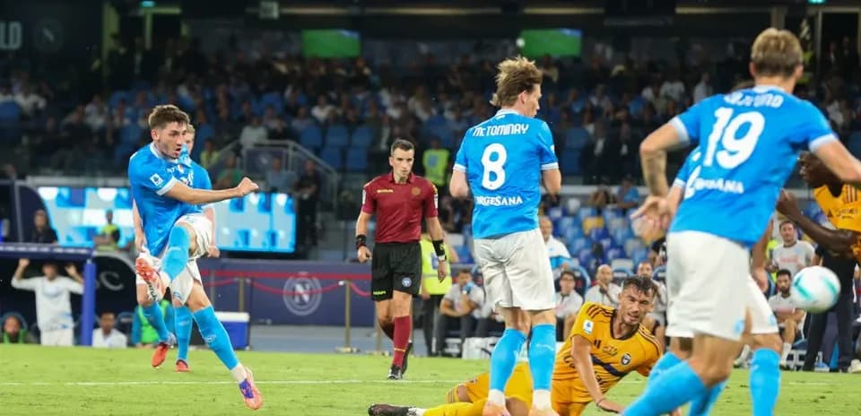 Napoli player taking a shot on goal