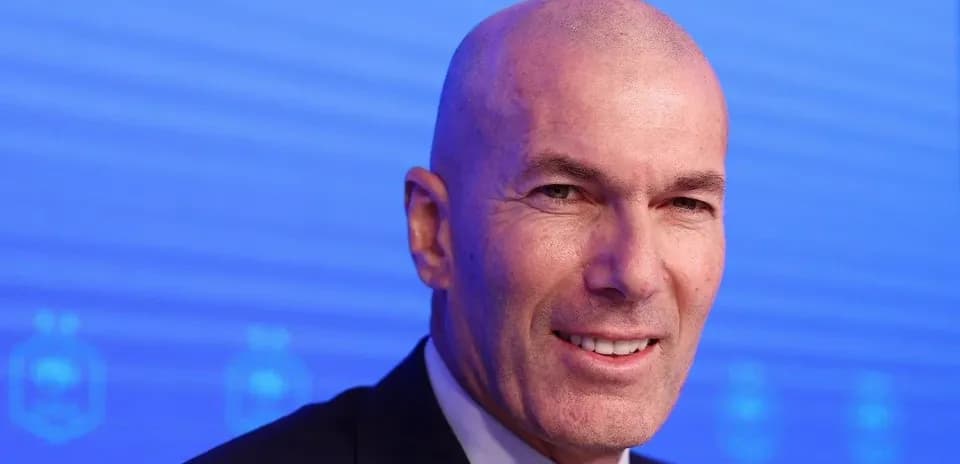 Man smiling during a press conference