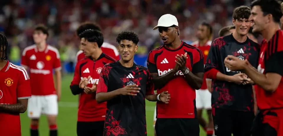Manchester United players celebrating after the match