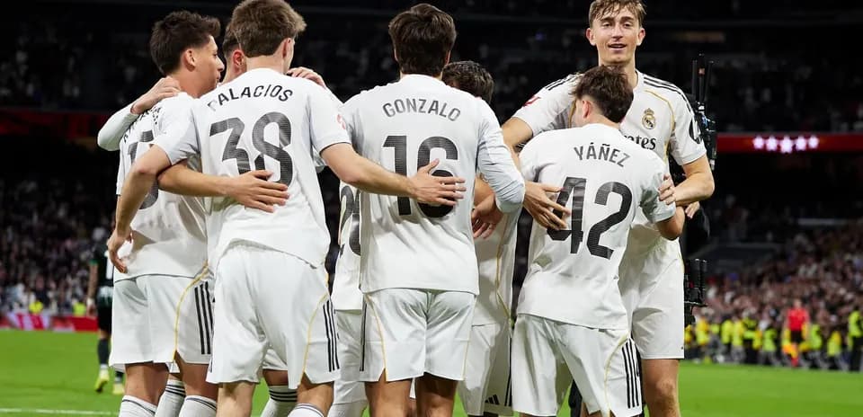 Real Madrid players celebrating a goal