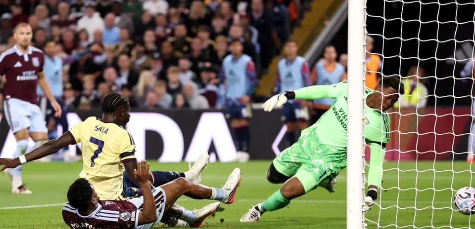Player colliding during Aston Villa vs Arsenal match