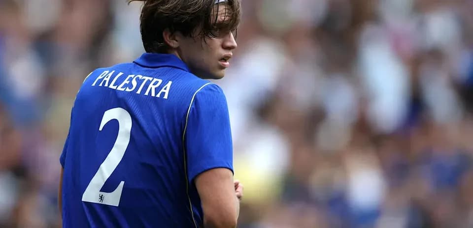 Player wearing blue jersey with 'Palestra' and number 2