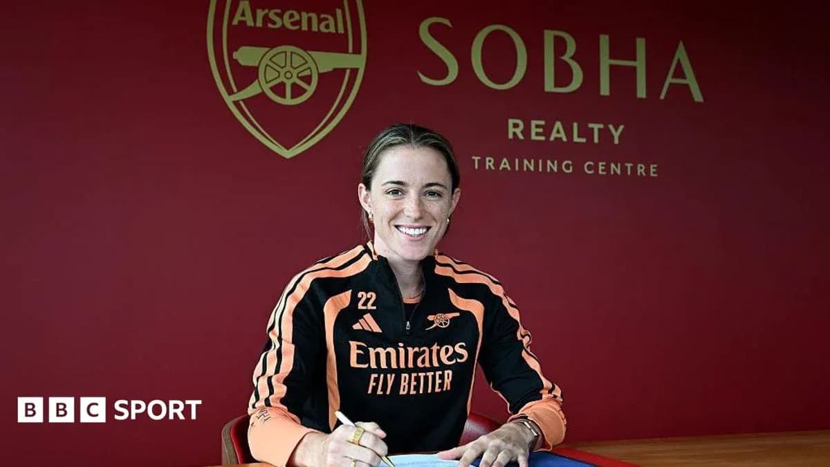 Player signing contract at Arsenal training centre Player signing contract at Arsenal training centre