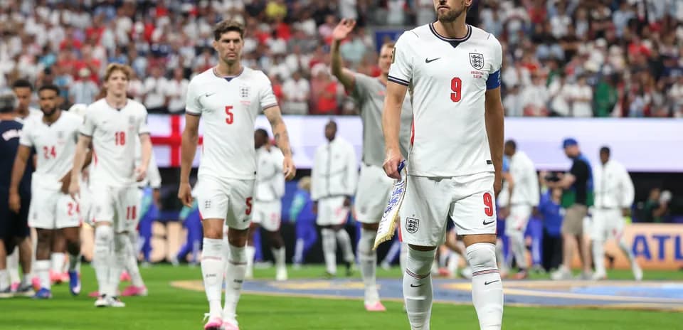 England players walking off the pitch after match