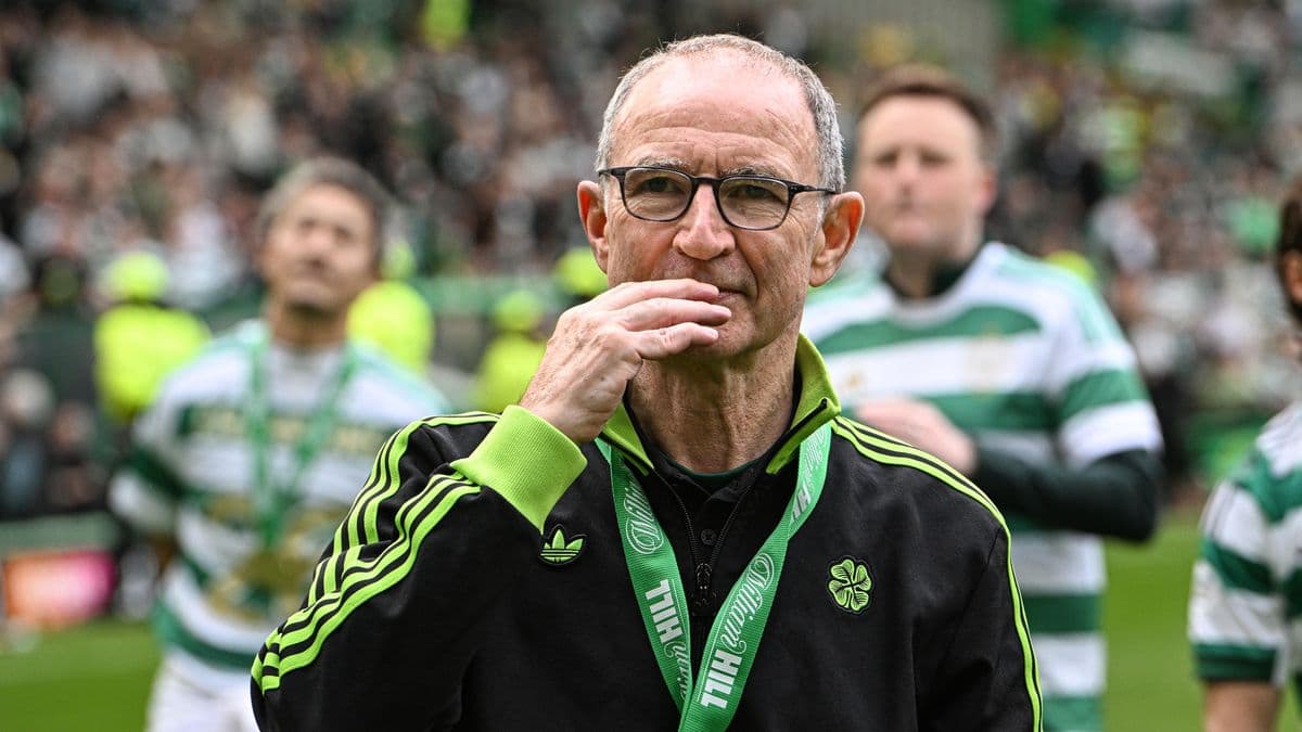 Coach with glasses at Celtic Park after match