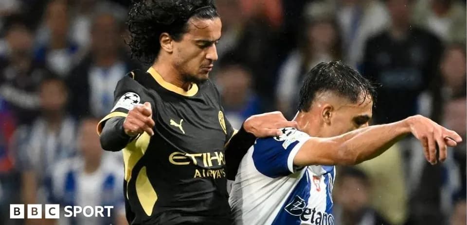 Two players contesting for the ball during match