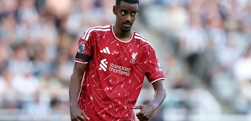 Player in Liverpool kit during match action